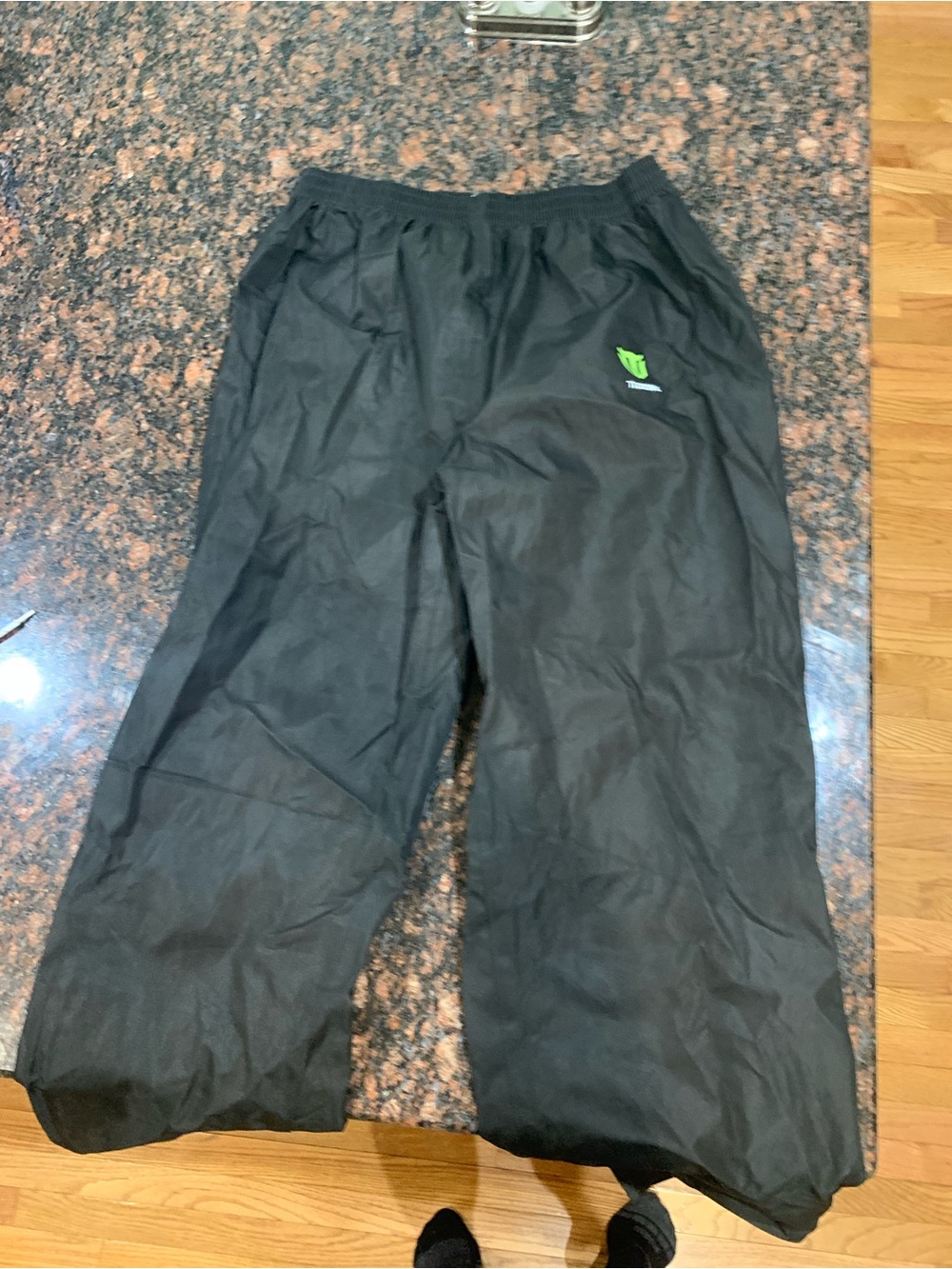Black Men's Lightweight Rain Pants with Green Logo
